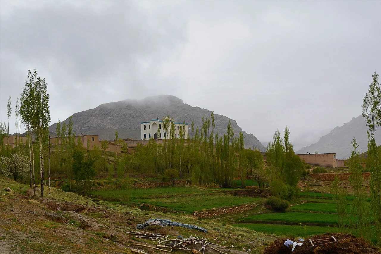 Mountain slopes and cultivated land in Malistan, Ghazni province.